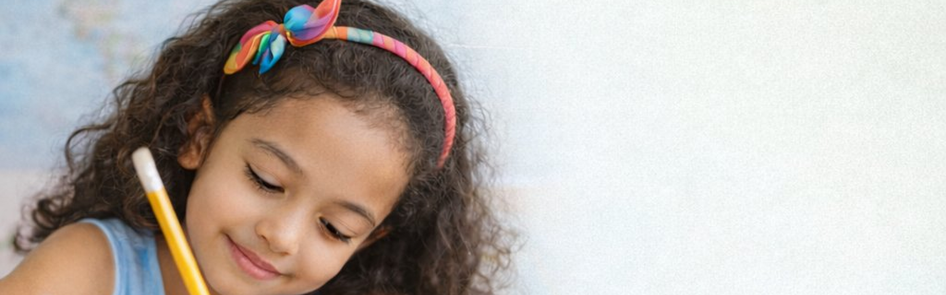 child writing, happy 