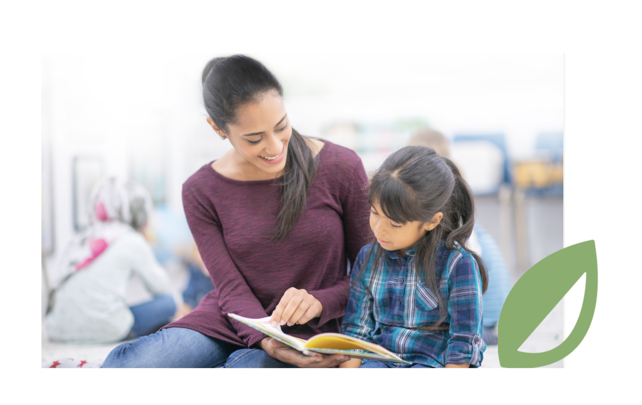Adult reading a book with a child