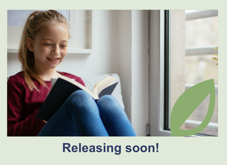 girl reading by window 